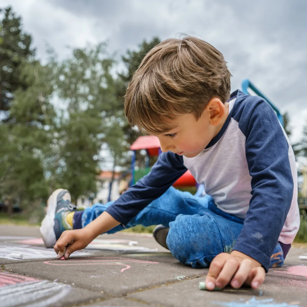 longworth education child with chalk